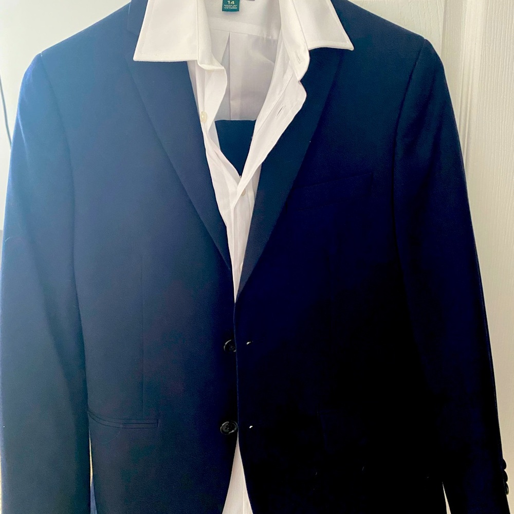 Beautiful suit with white dress shirt was never used with tags on.